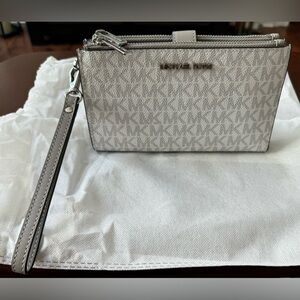 Michael Kors Signature Print Wristlet Wallet. Vanilla and gray.